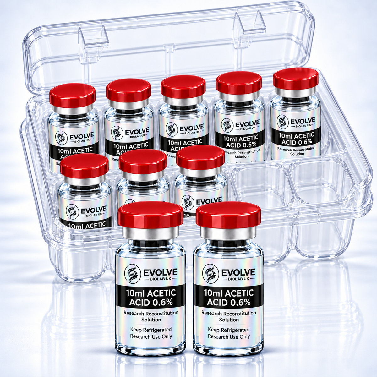 Acetic Acid 0.6% — 10 × 10ml - Ten clear glass 10 ml vials of 0.6% acetic acid with red caps, arranged in a transparent case.